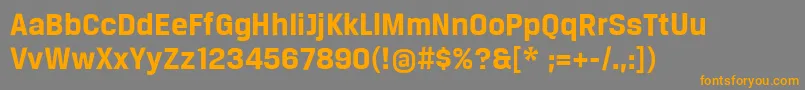 フォントBreuertextBold – オレンジの文字は灰色の背景にあります。