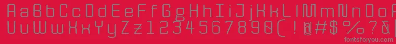 QuotaRegularext.-Schriftart – Graue Schriften auf rotem Hintergrund