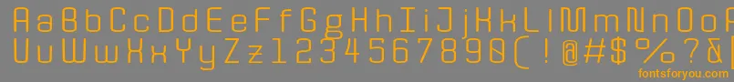 フォントQuotaRegularext. – オレンジの文字は灰色の背景にあります。