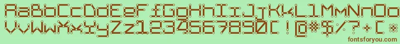 Шрифт TpfAbbetor – коричневые шрифты на зелёном фоне