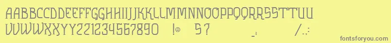 VtksSolution-fontti – harmaat kirjasimet keltaisella taustalla