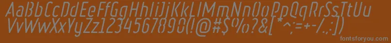 フォントRulerStencilItalic – 茶色の背景に灰色の文字