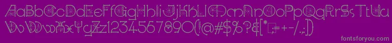 Шрифт KingthingsSpirogyra – серые шрифты на фиолетовом фоне