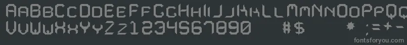 MavoleSinpoTfb-fontti – harmaat kirjasimet mustalla taustalla