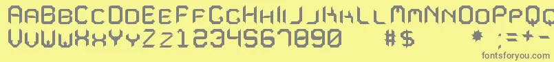 MavoleSinpoTfb-fontti – harmaat kirjasimet keltaisella taustalla