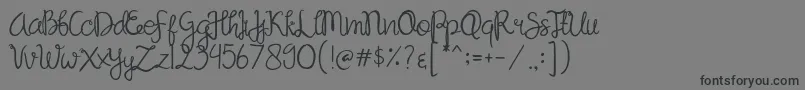 Sandat Font – Black Fonts on Gray Background
