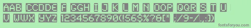 フォントSynchroReversedLetPlain.1.0 – 緑の背景に灰色の文字