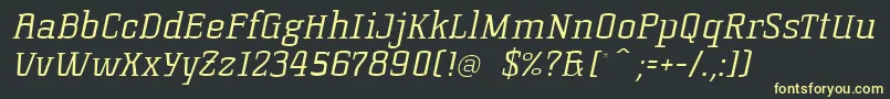 フォントKorneuburgslablightLightitalic – 黒い背景に黄色の文字