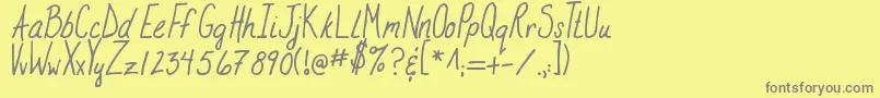 フォントMtfStampinRachel – 黄色の背景に灰色の文字