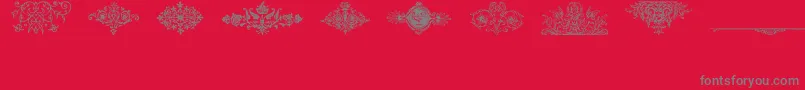 Frakturschmuck Font – Gray Fonts on Red Background