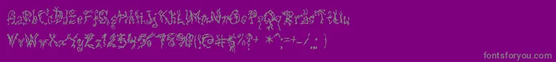 Pulsestate-fontti – harmaat kirjasimet violetilla taustalla