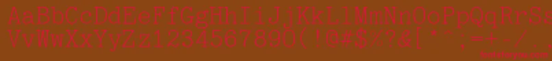 フォントOptimusc – 赤い文字が茶色の背景にあります。