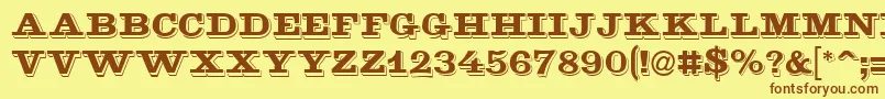 フォントGoldmine – 茶色の文字が黄色の背景にあります。