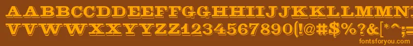 フォントGoldmine – オレンジ色の文字が茶色の背景にあります。