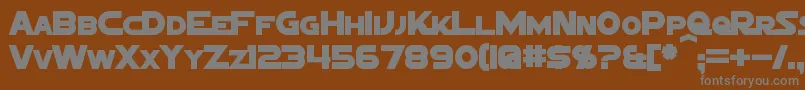 SigmaFiveMarqueeBold-fontti – harmaat kirjasimet ruskealla taustalla