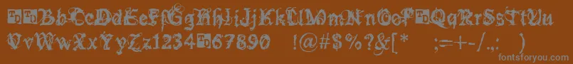 フォントBokononTrialVersion – 茶色の背景に灰色の文字