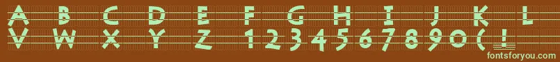 フォントStonecapsingrid – 緑色の文字が茶色の背景にあります。