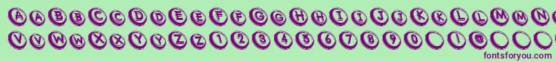 Comsrb-Schriftart – Violette Schriften auf grünem Hintergrund