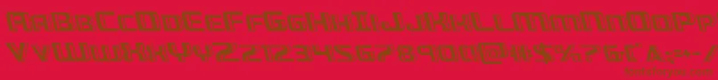 Greasegunleft-Schriftart – Braune Schriften auf rotem Hintergrund