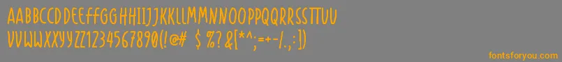 フォントHandapture – オレンジの文字は灰色の背景にあります。