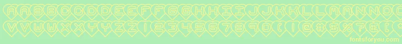 HeartsBrk Font – Yellow Fonts on Green Background