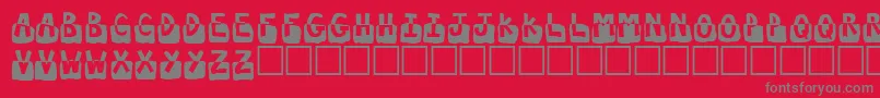Submergd-Schriftart – Graue Schriften auf rotem Hintergrund