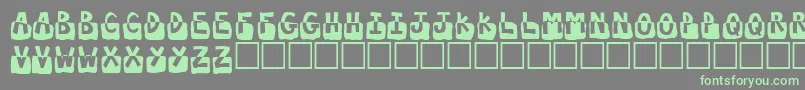 Submergd Font – Green Fonts on Gray Background