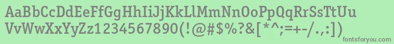 Czcionka Officinaserifmediumc – szare czcionki na zielonym tle
