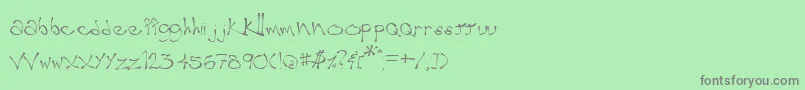 フォントWobble – 緑の背景に灰色の文字