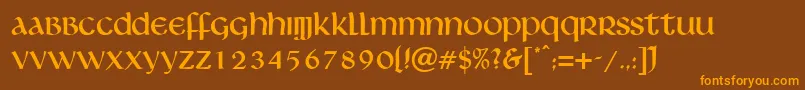 フォントLivingstone – オレンジ色の文字が茶色の背景にあります。