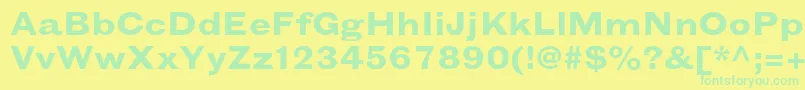 GrotesquemtstdBoldextended-Schriftart – Grüne Schriften auf gelbem Hintergrund