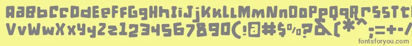 DPuntillasBToTiptoe Font – Gray Fonts on Yellow Background