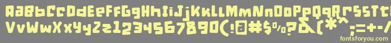 DPuntillasBToTiptoe Font – Yellow Fonts on Gray Background