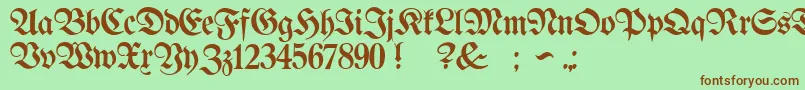 ProclamateLightLight-Schriftart – Braune Schriften auf grünem Hintergrund