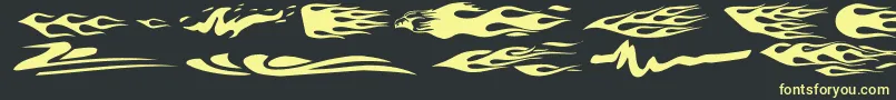 フォントVehicleDecalsFlamesArt – 黒い背景に黄色の文字