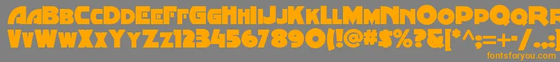 フォントMinstrelposternf – オレンジの文字は灰色の背景にあります。