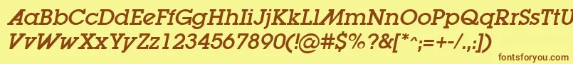 フォントLugaadOblique – 茶色の文字が黄色の背景にあります。