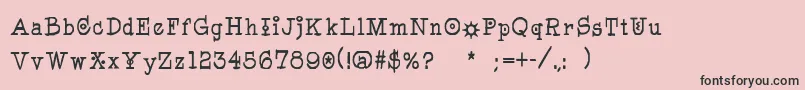 フォントPegyptienne – ピンクの背景に黒い文字