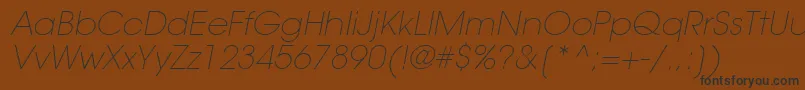 ItcAvantGardeGothicLtExtraLightOblique Font – Black Fonts on Brown Background