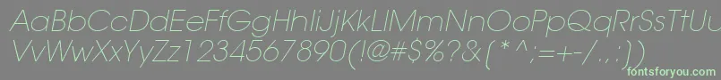ItcAvantGardeGothicLtExtraLightOblique Font – Green Fonts on Gray Background