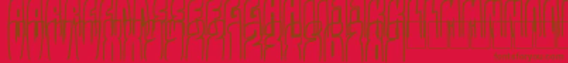 Kolossal Font – Brown Fonts on Red Background