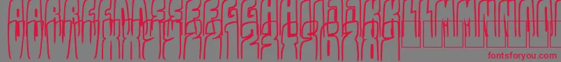 フォントKolossal – 赤い文字の灰色の背景