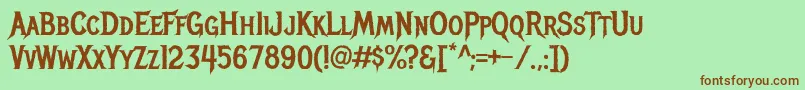 MetalmaniaRegular Font – Brown Fonts on Green Background