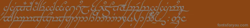 Czcionka TengwarAnnatarItalic – szare czcionki na brązowym tle