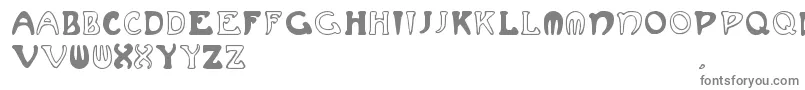 Muchafrenchcapitals-fontti – harmaat kirjasimet valkoisella taustalla