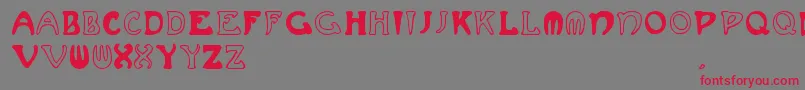 Muchafrenchcapitals-Schriftart – Rote Schriften auf grauem Hintergrund