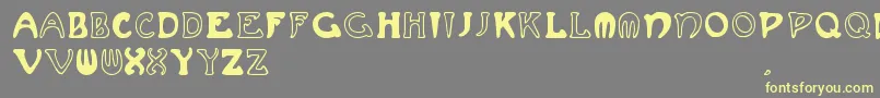 Muchafrenchcapitals Font – Yellow Fonts on Gray Background