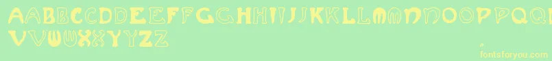 Muchafrenchcapitals-fontti – keltaiset fontit vihreällä taustalla