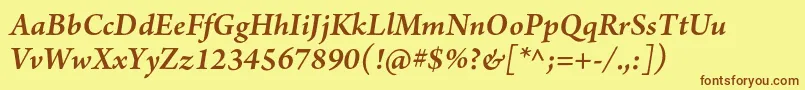 ArnoproSmbditalic-Schriftart – Braune Schriften auf gelbem Hintergrund