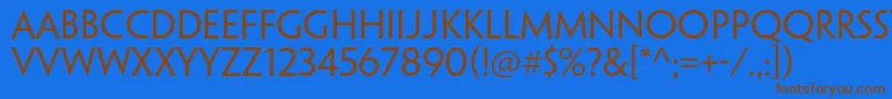 フォントPenumbraflarestdRegular – 茶色の文字が青い背景にあります。